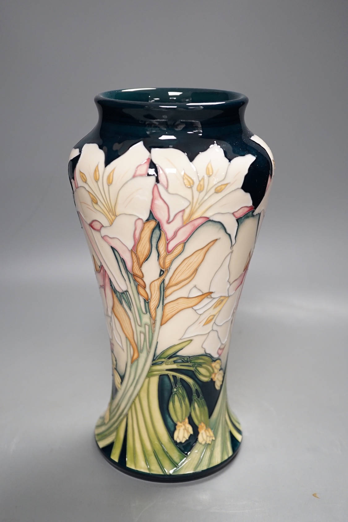 A Moorcroft 'Madonna lily' vase by Paul Hilditch, limited edition 8/40, 2013, 25.5 cms high.